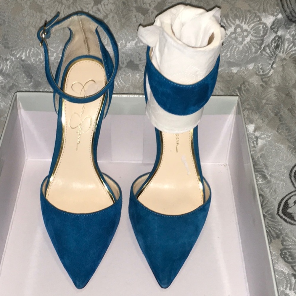 Gently used aqua suede shoes.